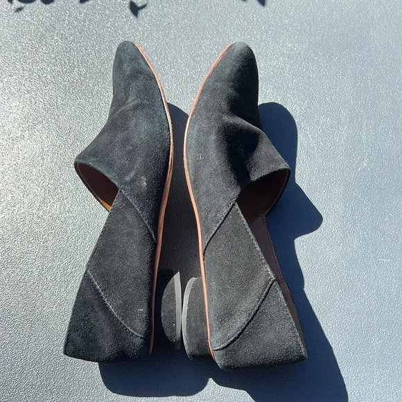 The Row black suede loafer